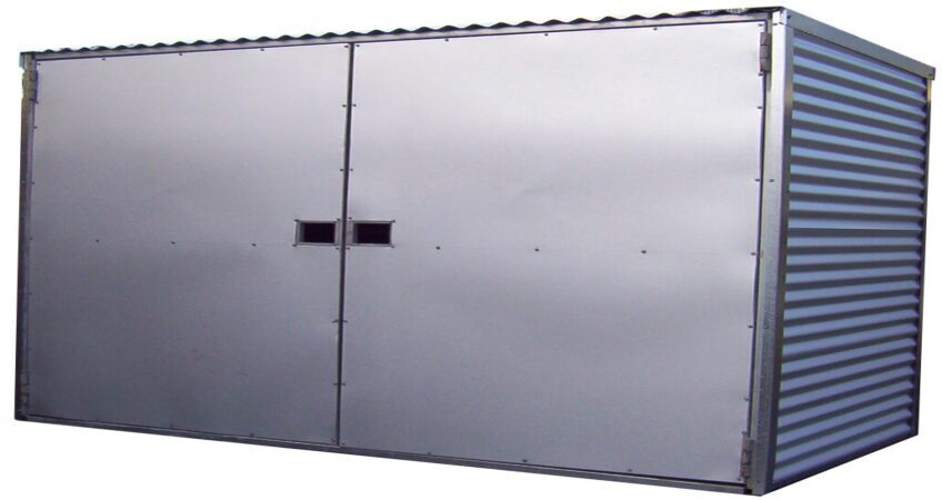 Gray modular steel container with small square windows, isolated against a plain background.